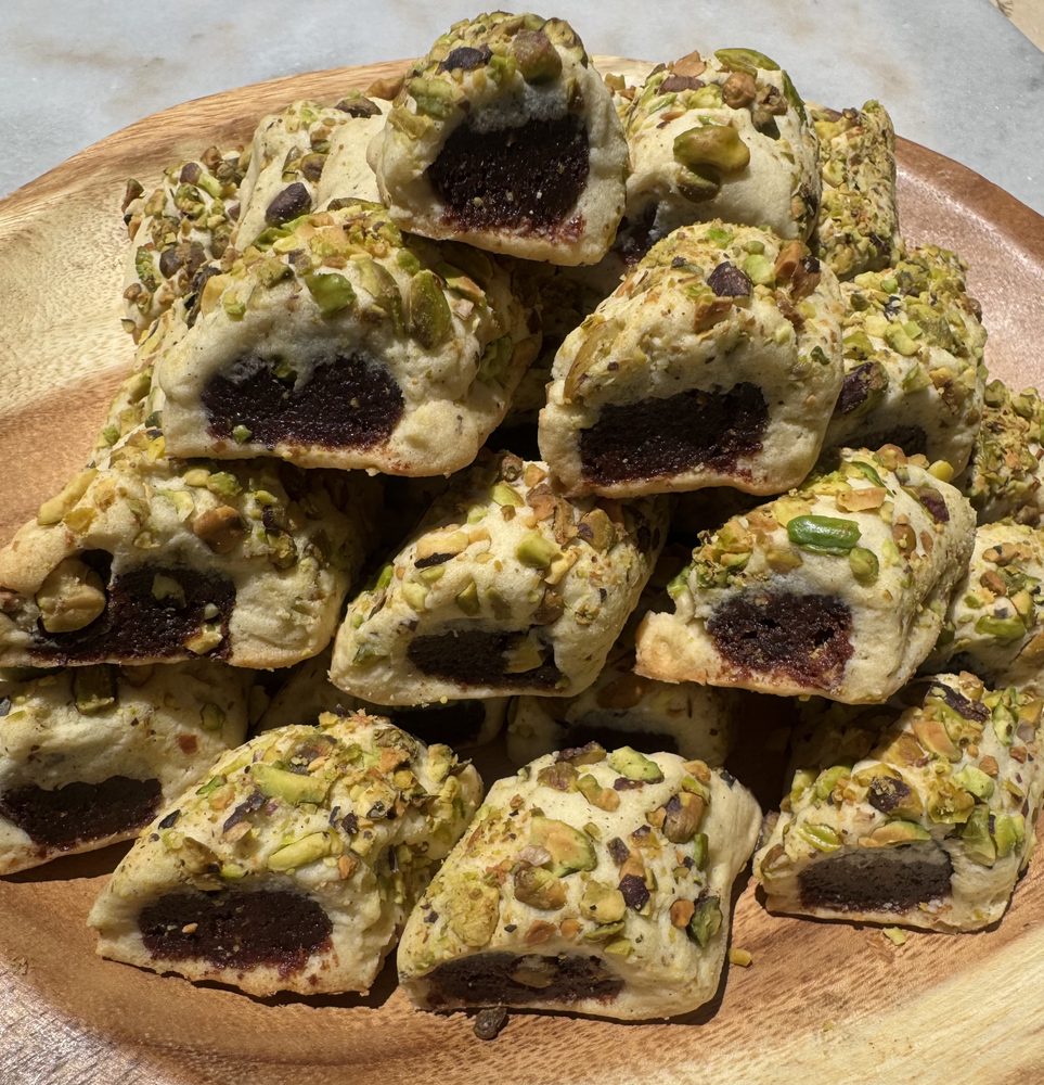 Date ghraybeh rolled in pistachios